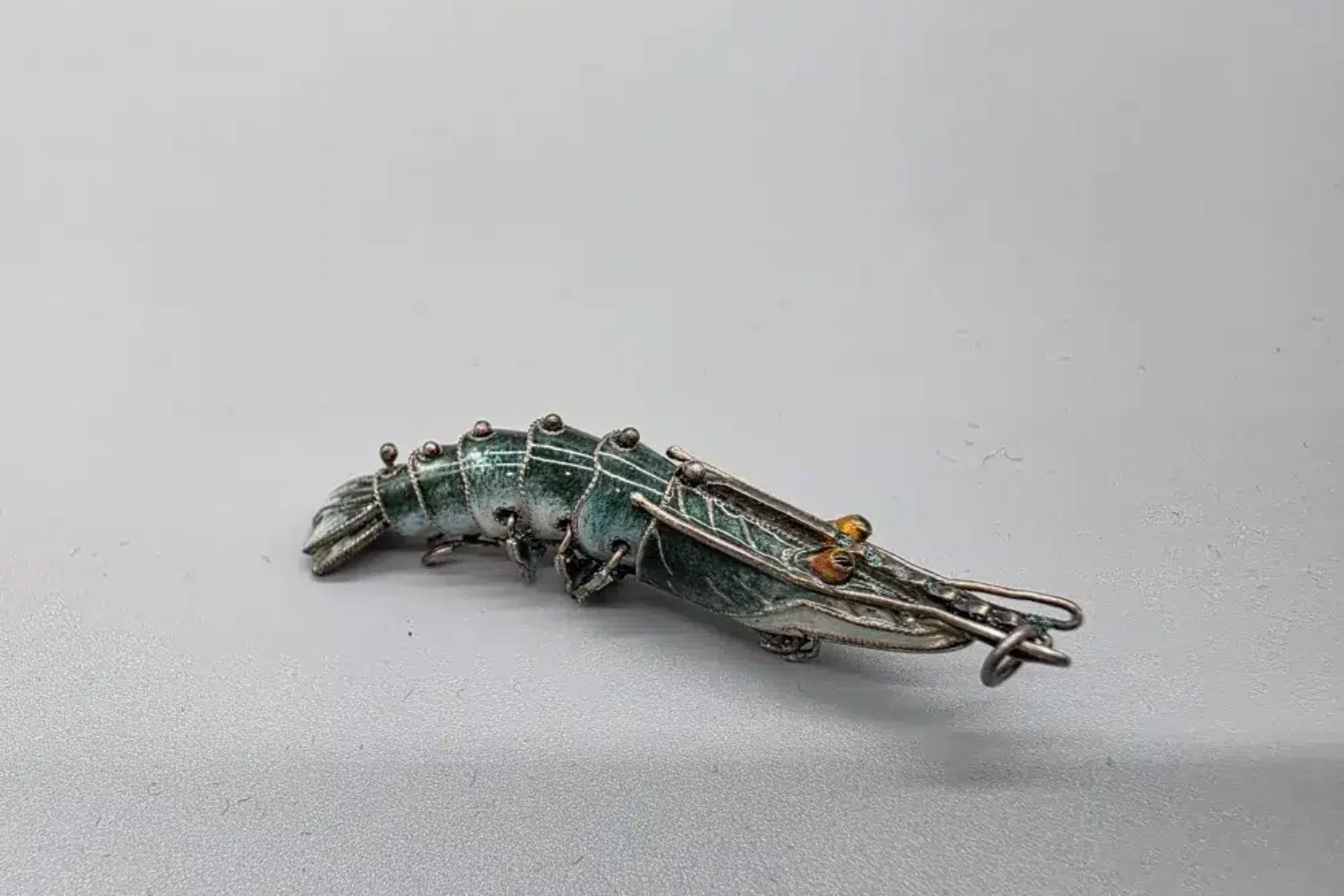 Ankauf emaillierter Silberbroschen mit Tiermotiv