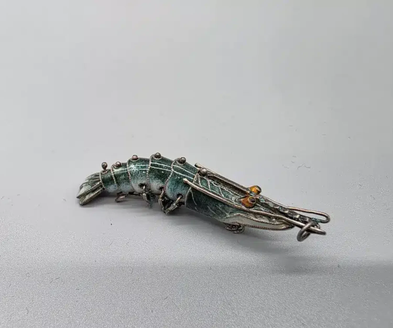 Ankauf emaillierter Silberbroschen mit Tiermotiv